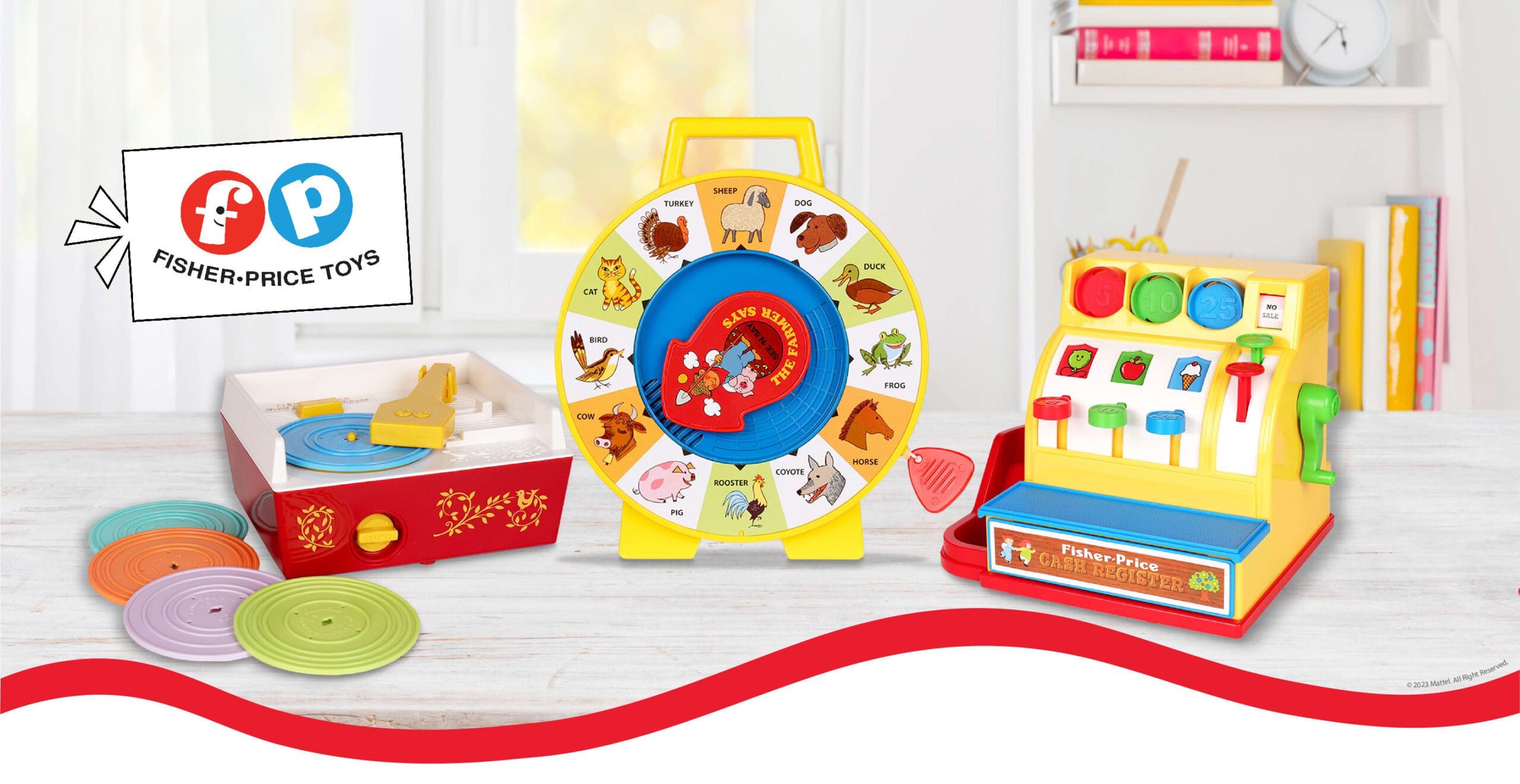 Fisher price banner showing three toys on a desk background