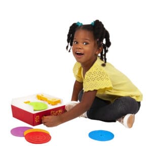 Fisher-Price Record Player | girl smiling next to toy