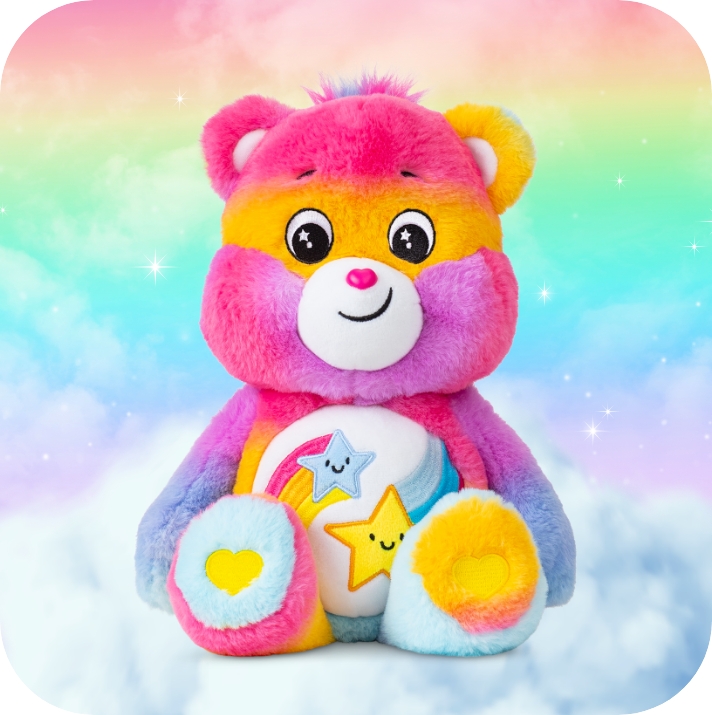 Care Bears medium plush sitting on clouds and rainbow in the background