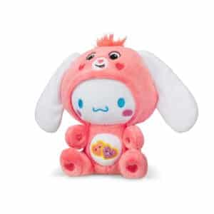 Care Bears Funsize Cinnamoroll plush displayed on a white background, featuring a cute design with a pink heart emblem on its stomach, promoting love and friendship.